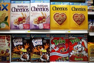 Rows of different types of cereals at a grocery store