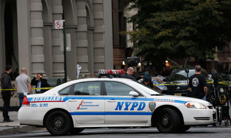 NYPD cars outside the apartment