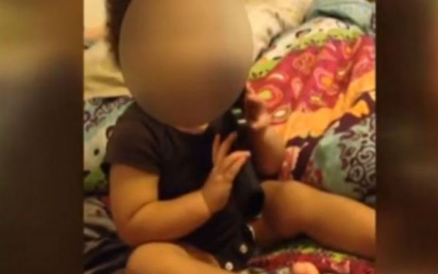 1-Y-Old Plays With Gun