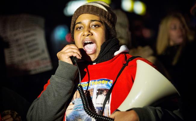 Erica Garner, daughter of Eric Garner, leads a march of people protesting the Staten Island, New York grand jury's decision not to indict a police officer involved in the chokehold death of Eric Garner in July, on December 11, 2014 in the Staten Island Neighborhood of New York City. (Andrew Burton/Getty Images)