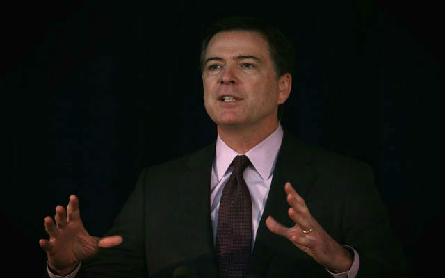 FBI Director James Comey addresses the Overseas Security Advisory Council's 29th Annual Briefing November 19, 2014 at the State Department in Washington, DC. This years theme for the briefing is 'Balancing Security and Privacy Challenges in an Information Age.' (Photo by Alex Wong/Getty Images)