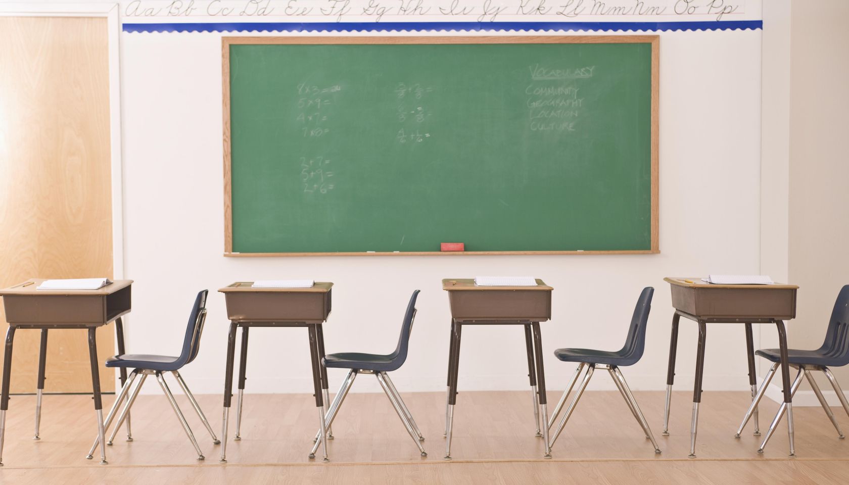 desks in row in classroom