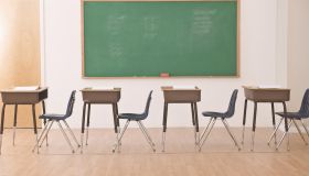 desks in row in classroom