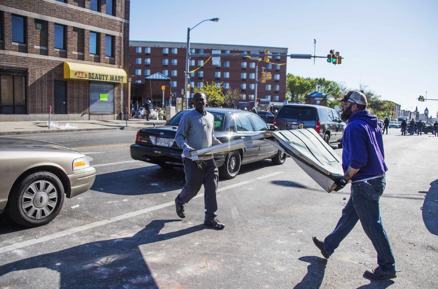 13 Photos You Won't See Of Volunteers Cleaning Up The Streets Of Baltimore