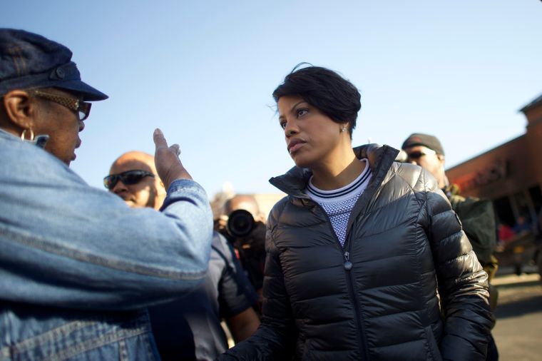 Mayor Stephanie Rawlings-Blake talks to civilians after Monday's riots.