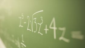 Math problems on chalkboard