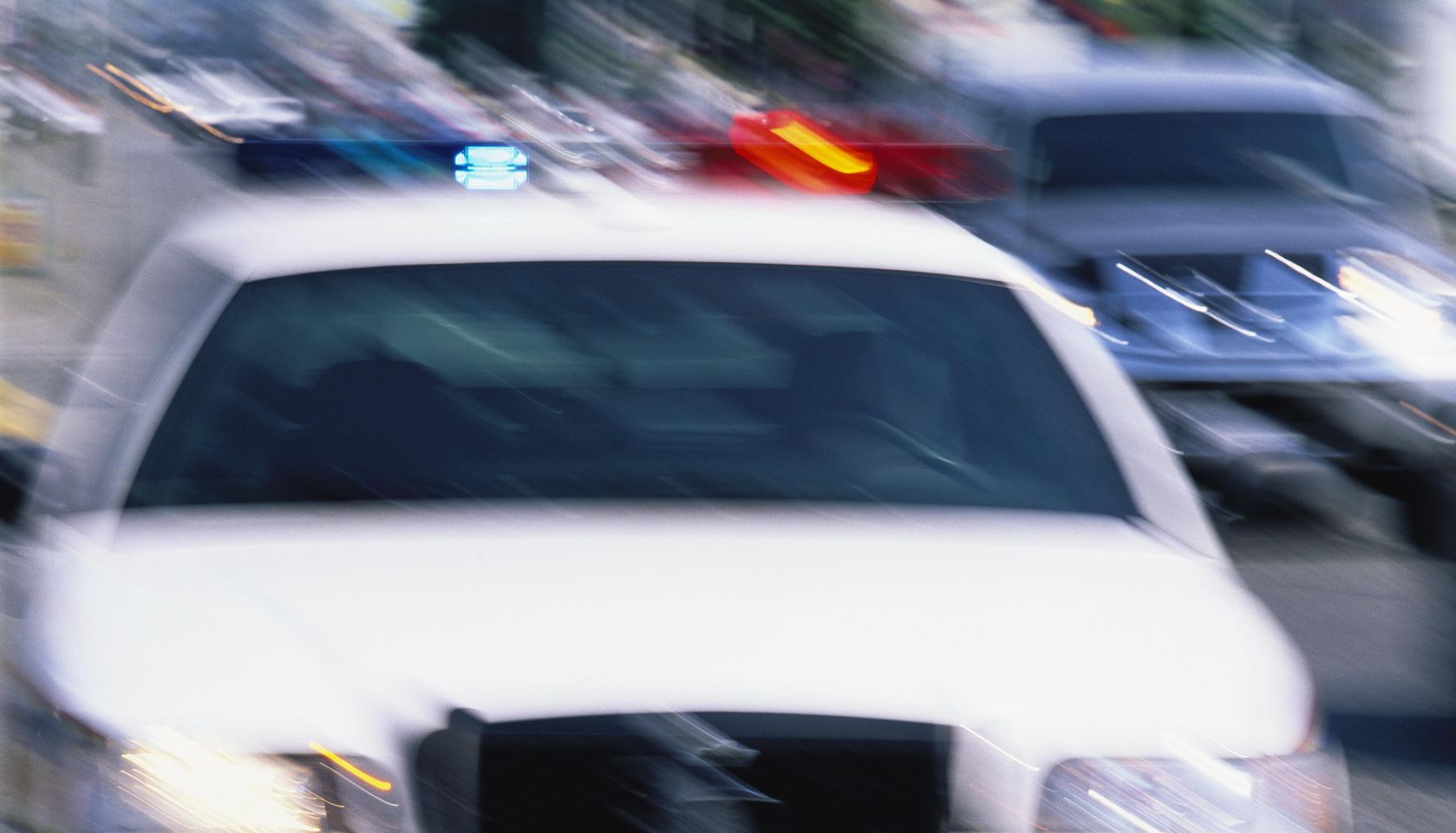 Police Car With Emergency Lights On