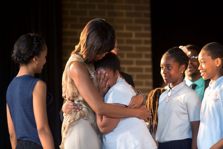 Michelle Obama greeting students with Kerry Washington after their performance at Savoy Elementary School in Washington, D.C.