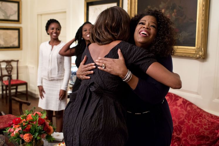 Michelle Obama greeting Oprah Winfrey and others at the White Hous
