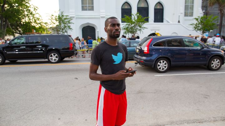 Activist DeRay McKesson is seen outside of Emanuel AME church.