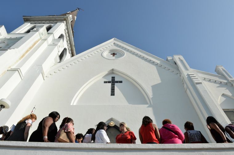 People line up to enter for Sunday service at the Emanuel AME Church.