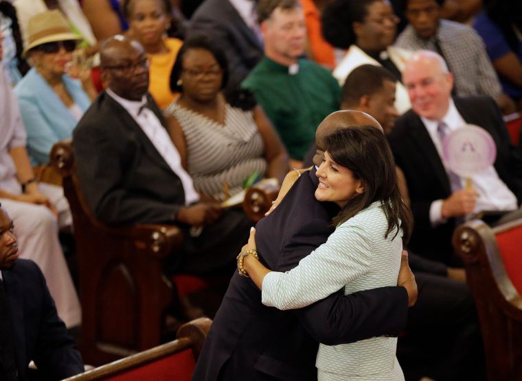 South Carolina Gov. Nikki Haley, R-S.C., embraces U.S. Sen Tim Scott, R-S.C., at Emanuel AME Church.