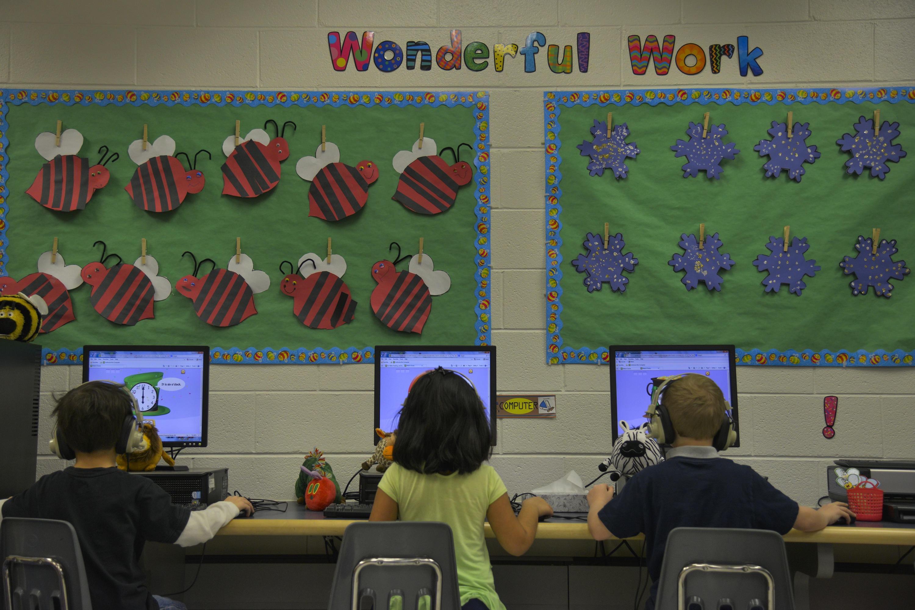 Kids In A Classroom Using Computers