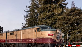 The Napa County wine train offers lunch and wine tasting aboard vintage coaches, and stops for one o