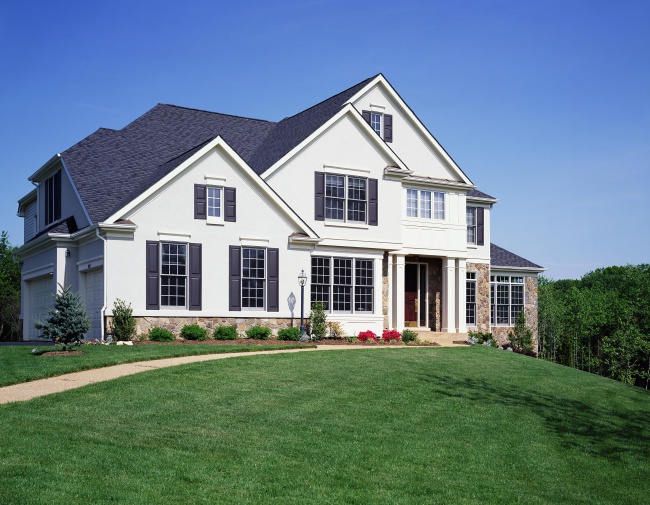 House exterior with surrounding yard