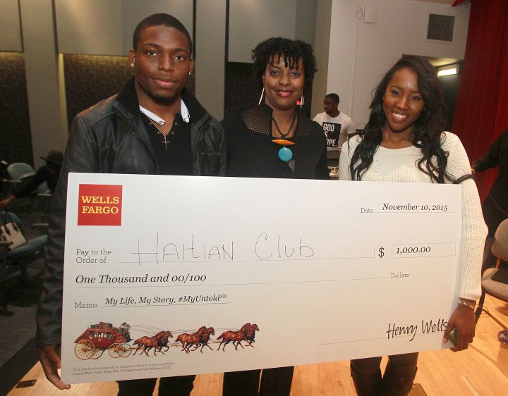 Wells Fargo awards the Spelman College Haitian Club $1,000 to fund community initiatives during the My Life, My Story, #MyUntold℠ Town Hall on November 10, 2015 at the Atlanta University Center Consortium. Vice President, African American segment manager for Wells Fargo, Lisa Frison, presents the check to the organization’s leaders.
