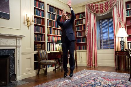 FEBRUARY: President Barack Obama fakes a jump shot during an Affordable Care Act video taping for BuzzFeed in the White House Library. The video went viral thanks to jokes about his presidency and ultra-cool swag.