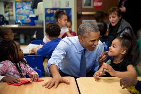 JANUARY: President Barack Obama has an adorable moment with Akira Cooper at the Community Children’s Center, one of the nation’s oldest Head Start providers, in Lawrence, Kan.