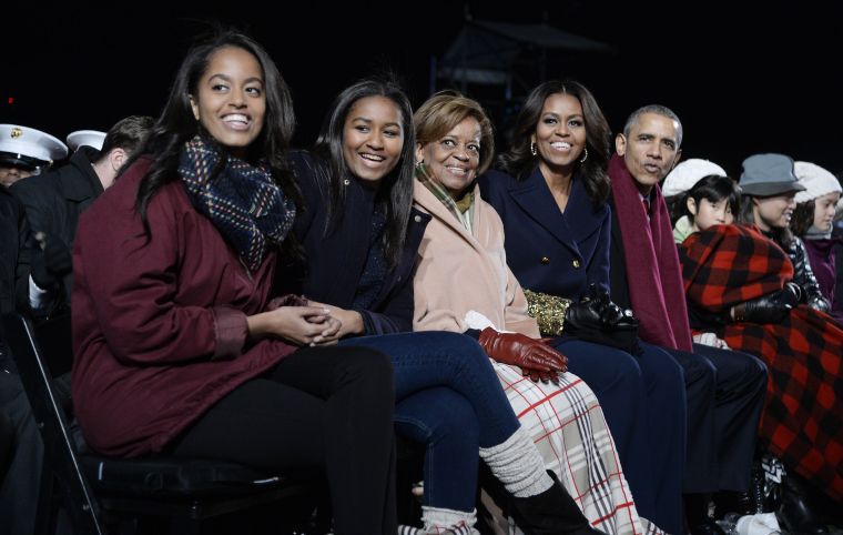 DECEMBER: All grown up! The First Family, including Obama's mother-in-law Marian Robinson, is seen at the White House's national Christmas tree lighting ceremony on Dec. 2.