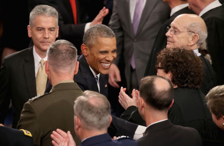 President Barack Obama arrives at Capitol Hill for his eight and final State of the Union address.