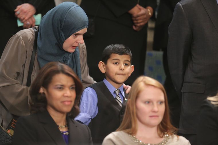 Ahmad Alkhalaf, 9, arrives at US Capitol Hill for the president’s speech. The Syrian refugee was invited by Rep. Seth Moulton after losing both of his arms in an ISIL bomb attack in Syria.
