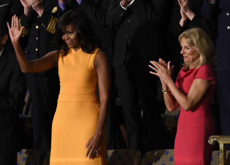 First Lady Michelle Obama and Jill Biden greet the crowd before the State of the Union address.