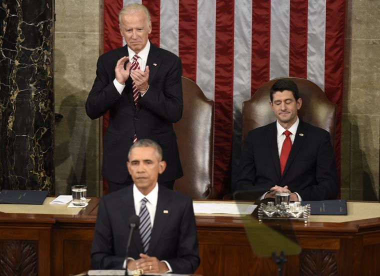 Always in president's corner, Joe Biden gives Obama a standing ovation at his final State of the Union address.
