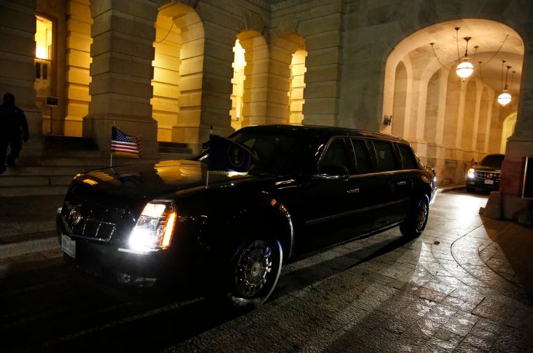 President Barack Obama arrives in the presidential limo on Capitol Hill for the final State of the Union address.