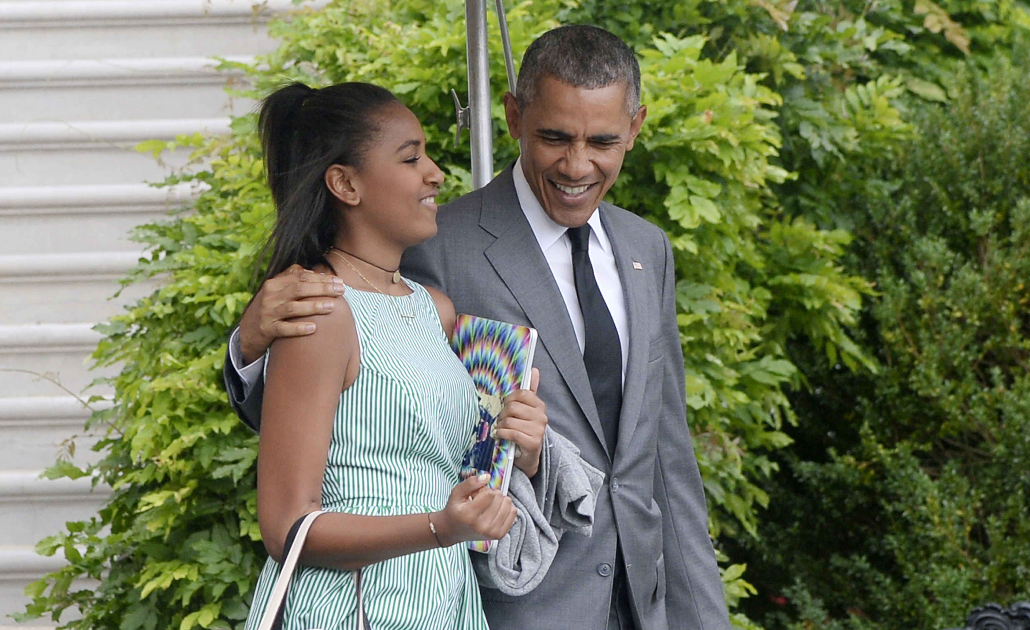 President Barack Obama and daughter Sasha depart the White House- DC