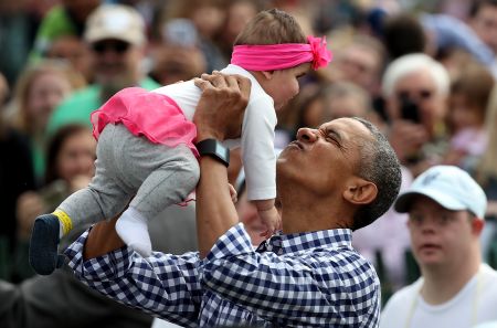 President Obama Greets A Baby At The 2016 White House Easter Egg Roll