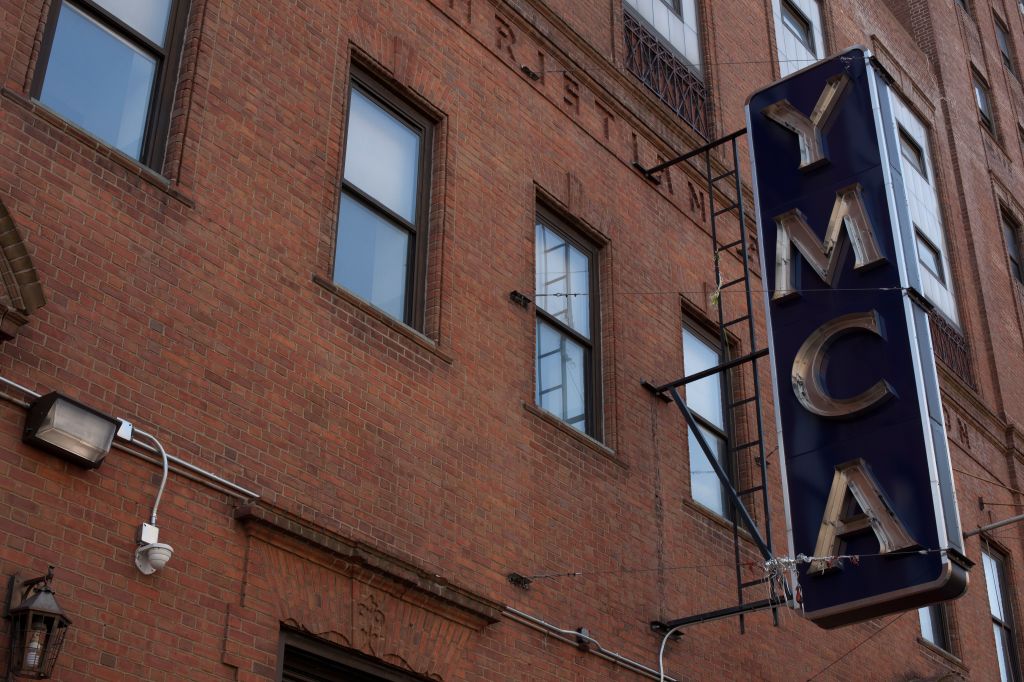 Low angle view of neon sign on a building, Harlem YMCA, West 135th Street, Harlem, Manhattan, New York City, New York State, USA