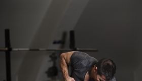 Man training in crossfit gym