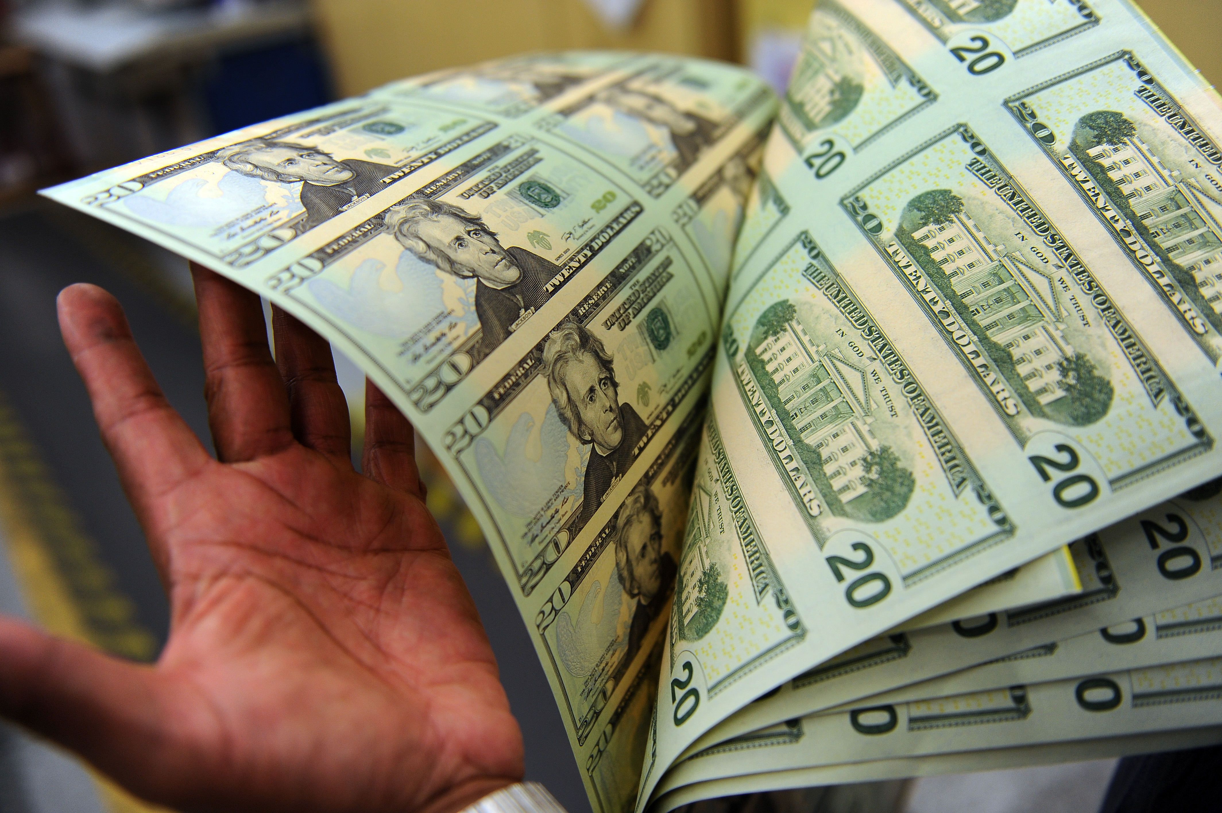 Bureau of Engraving and Printing making money.