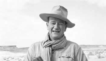 John Wayne on the set of the film Legend of the Lost