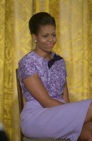 First lady Michelle Obama speaks in the East Room of the...