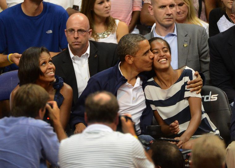 Barack Gives Daughter Malia a Kiss