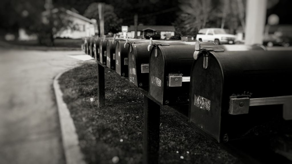 Close-Up Of Mailboxes By Street