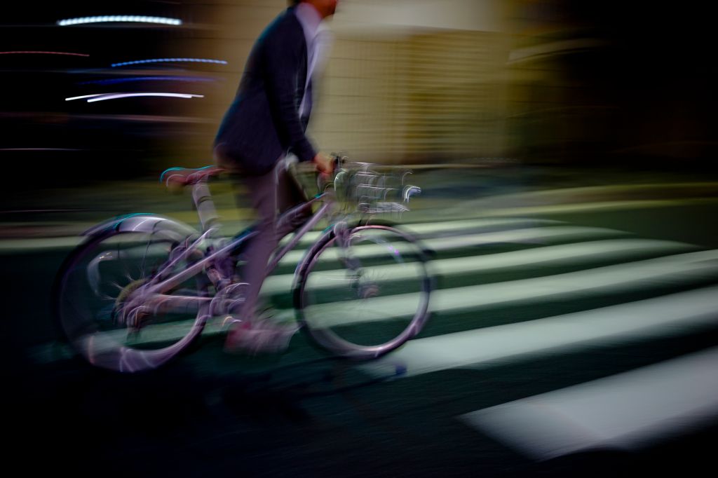 Cyclist traveling in Kyoto