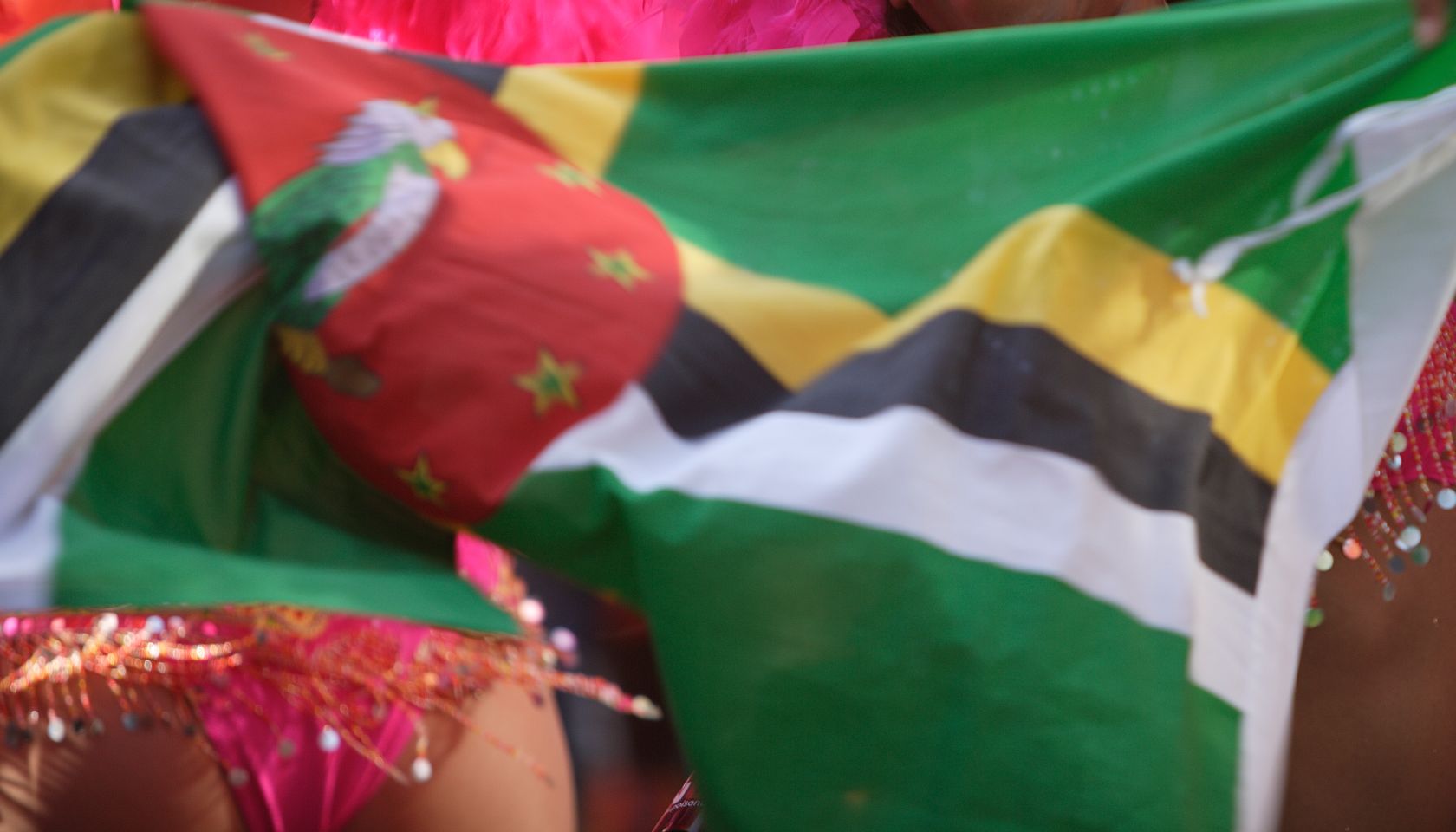 Participant wearing festive costume at Notting Hill Carnival, Notting Hill, London, London, England.
