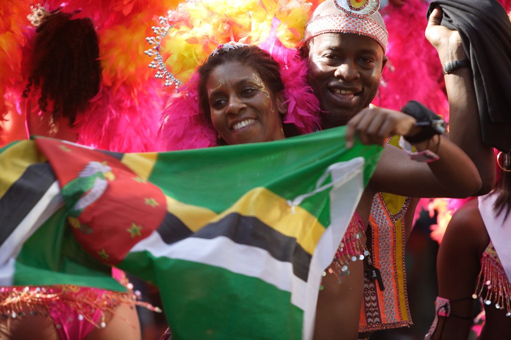 Participant wearing festive costume at Notting Hill Carnival, Notting Hill, London, London, England.