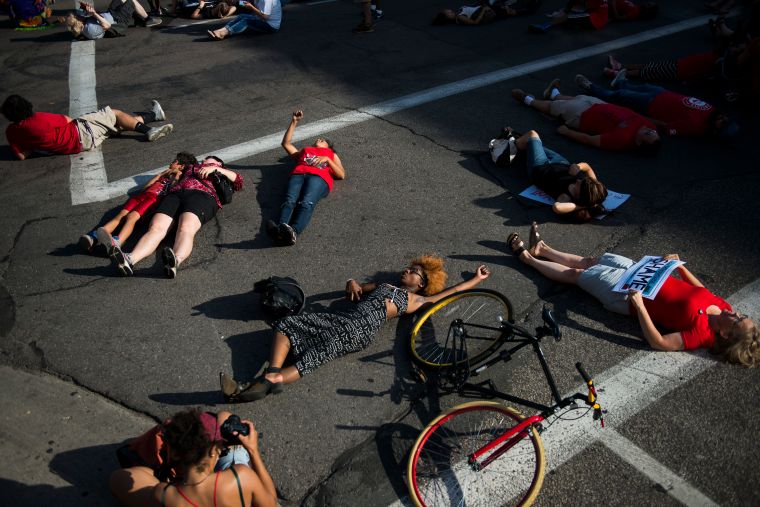 Activists Hold March Protesting Police Shooting Of Philando Castile