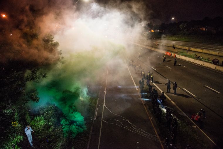 Activists Hold March Protesting Police Shooting Of Philando Castile