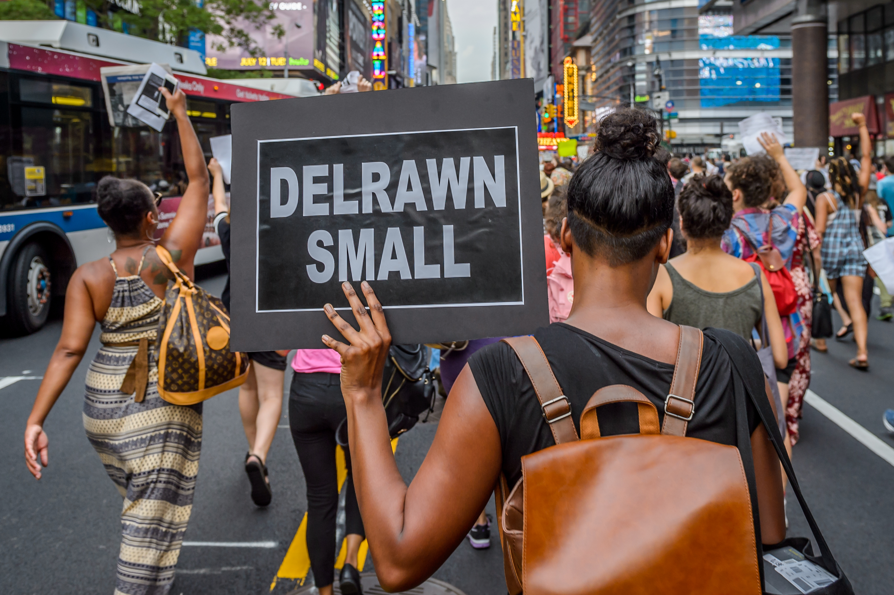 About two thousand New Yorkers marched in Manhattan bringing...