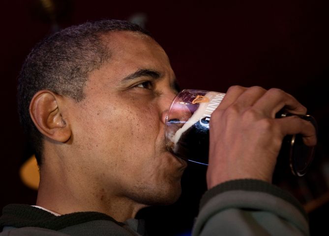 US President Barack Obama drinks a Guinn