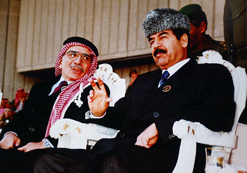 IraqThe late King Hussein of Jordan with Saddam Hussein at the Iraqi military parade grounds in a