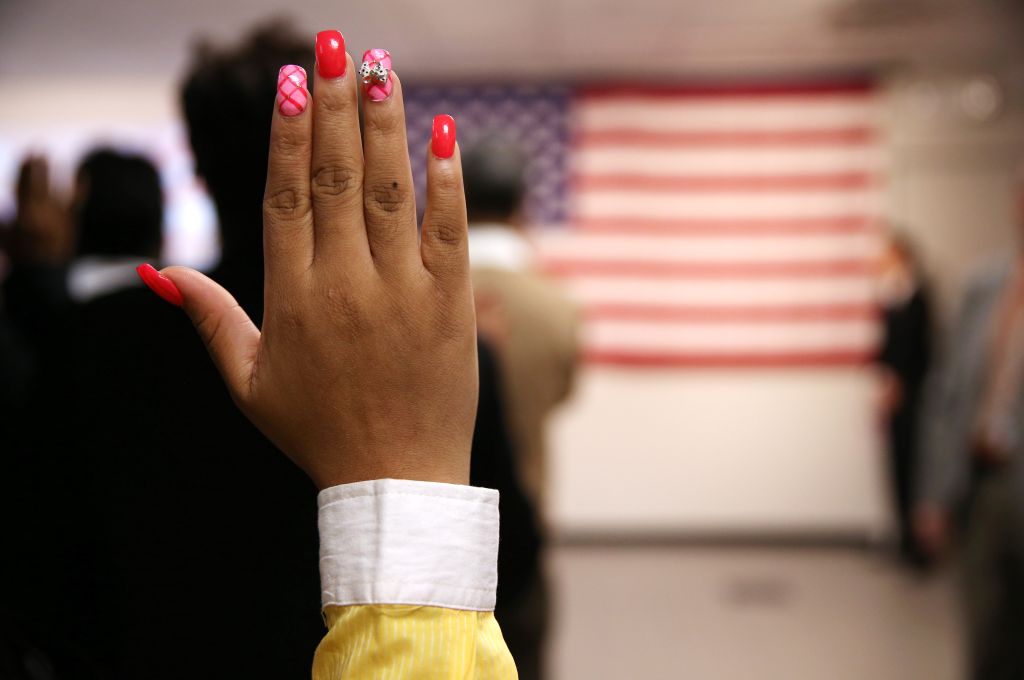 Immigrants Sworn In As US Citizens At Naturalization Ceremony