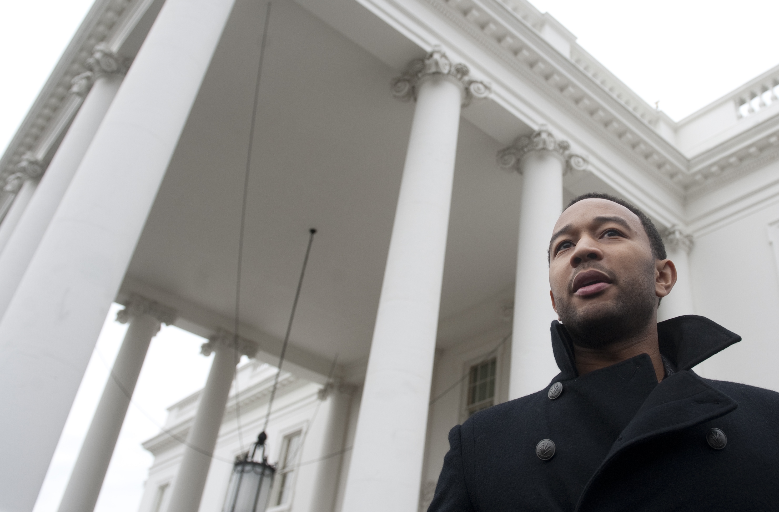 Singer John Legend speaks to the media w