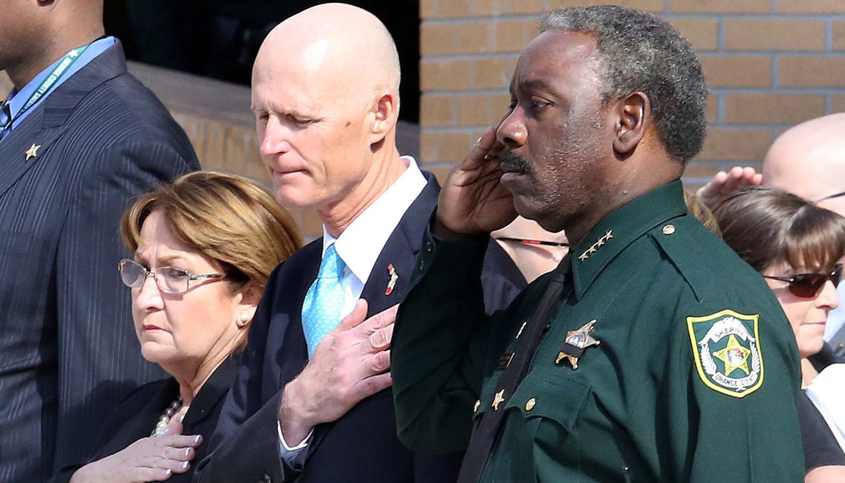 Orlando police officer shot and killed; deputy dies in crash during manunt for suspect