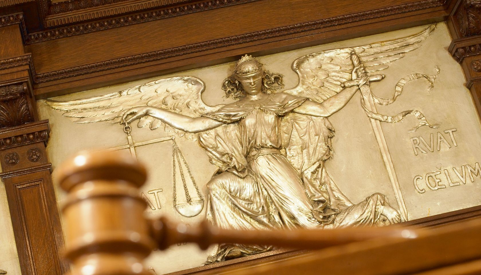 Gavel and Figure of Justice