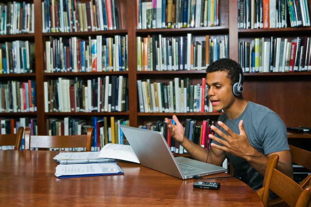 College student studying in a library